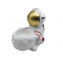 ceramic candle holder astronaut design